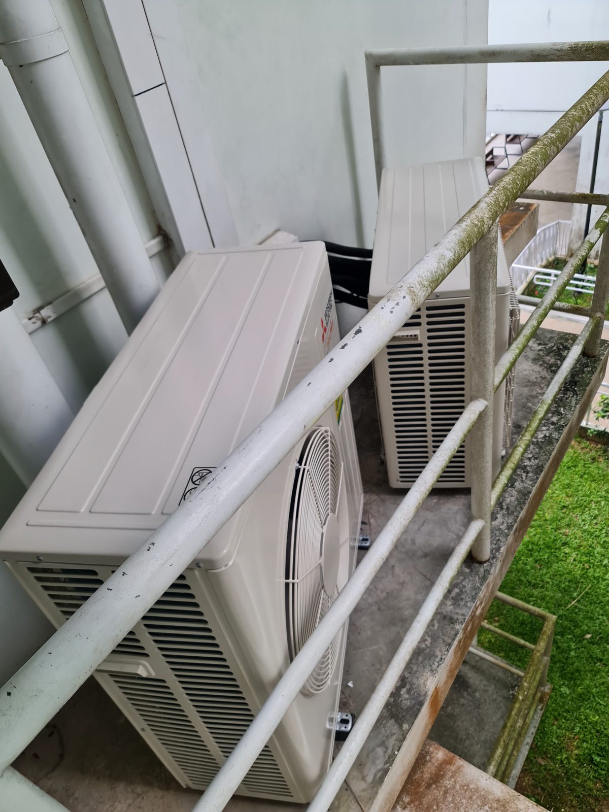 Sincere Air Conditioning Pte Ltd on the job in Paya Lebar